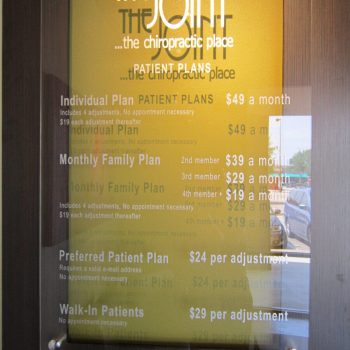 A clear vinyl sign in a doctors office by Bill Bailey's Signs.