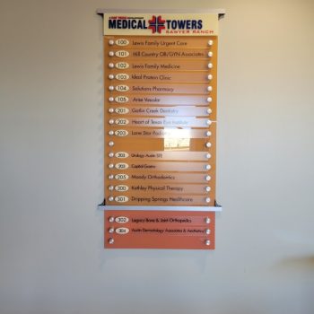 A medical office directory sign.
